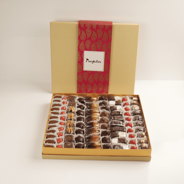 Ass. Milk and Dark Chocolate, Ass. Confits, Ass. Dates, Ass. Nougat, Milk Chocolate Date Paste Nutmeg & Hazelnut, Dark Chocolate Date Paste Walnut & Cinnamon